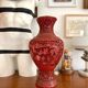 Asian metal vase and red resin