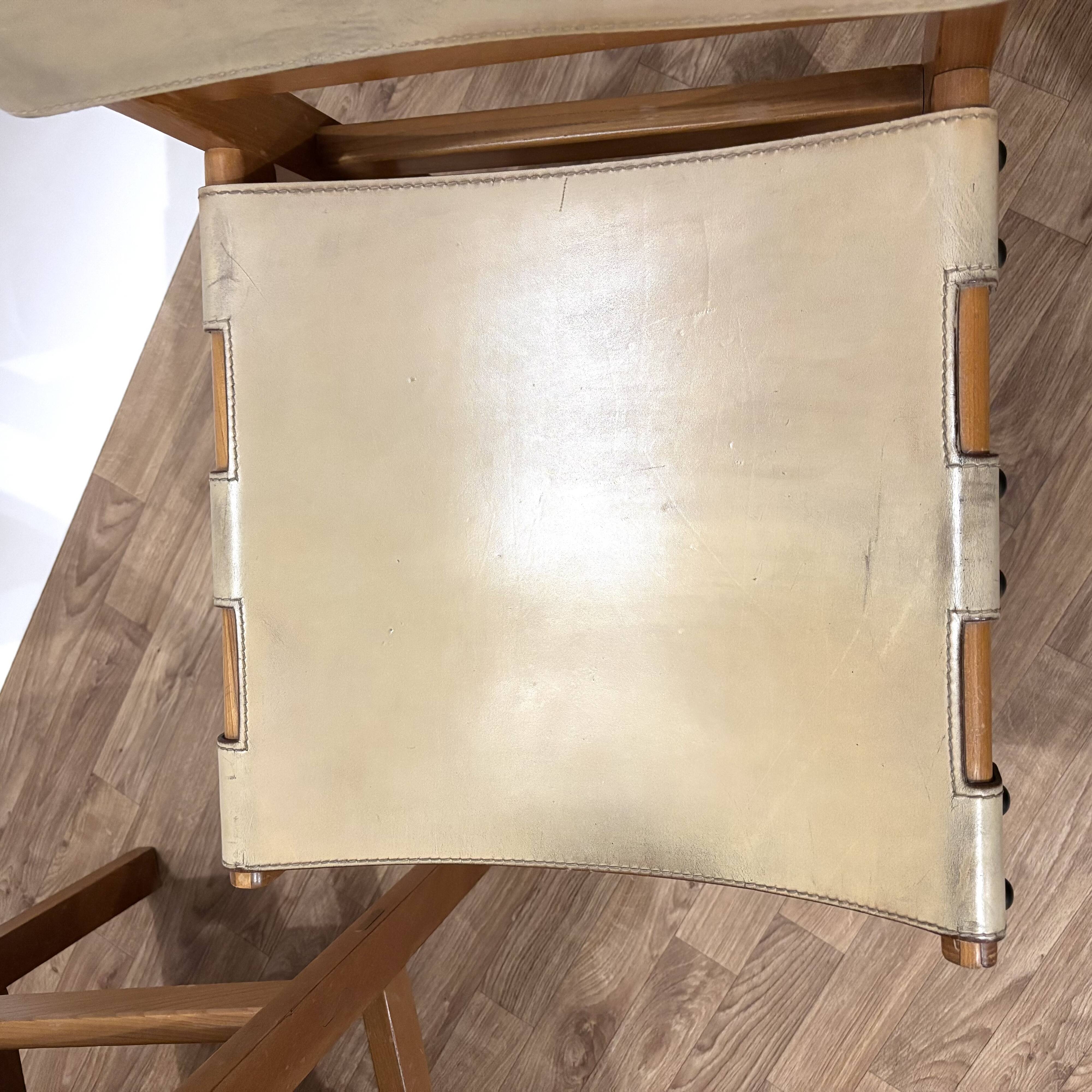 Pair of Maison Regain leather chairs