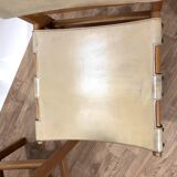 Pair of Maison Regain leather chairs