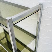 Chrome and smoked glass shelf in Italian 1970s style.