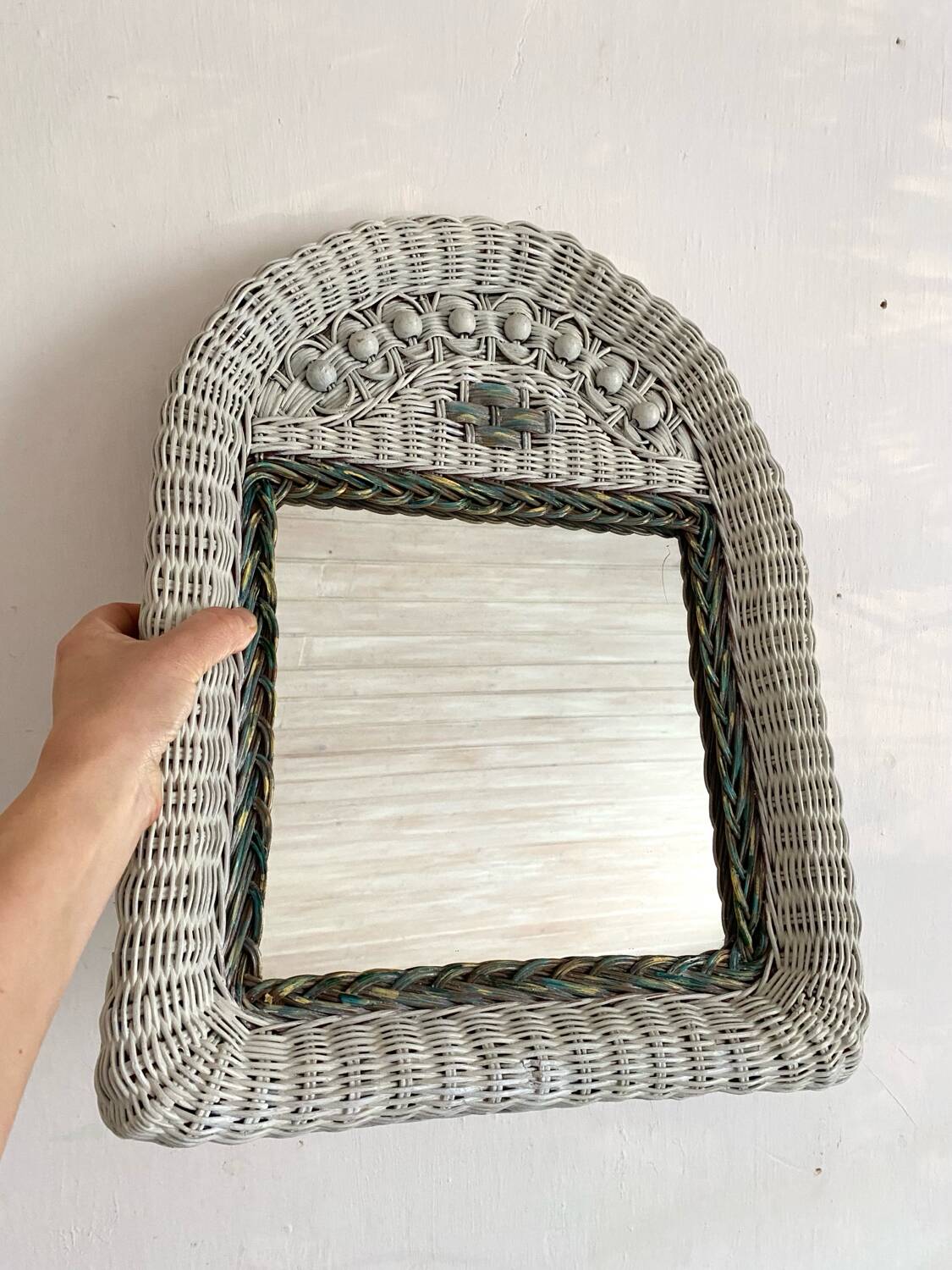 Vintage woven rattan mirror