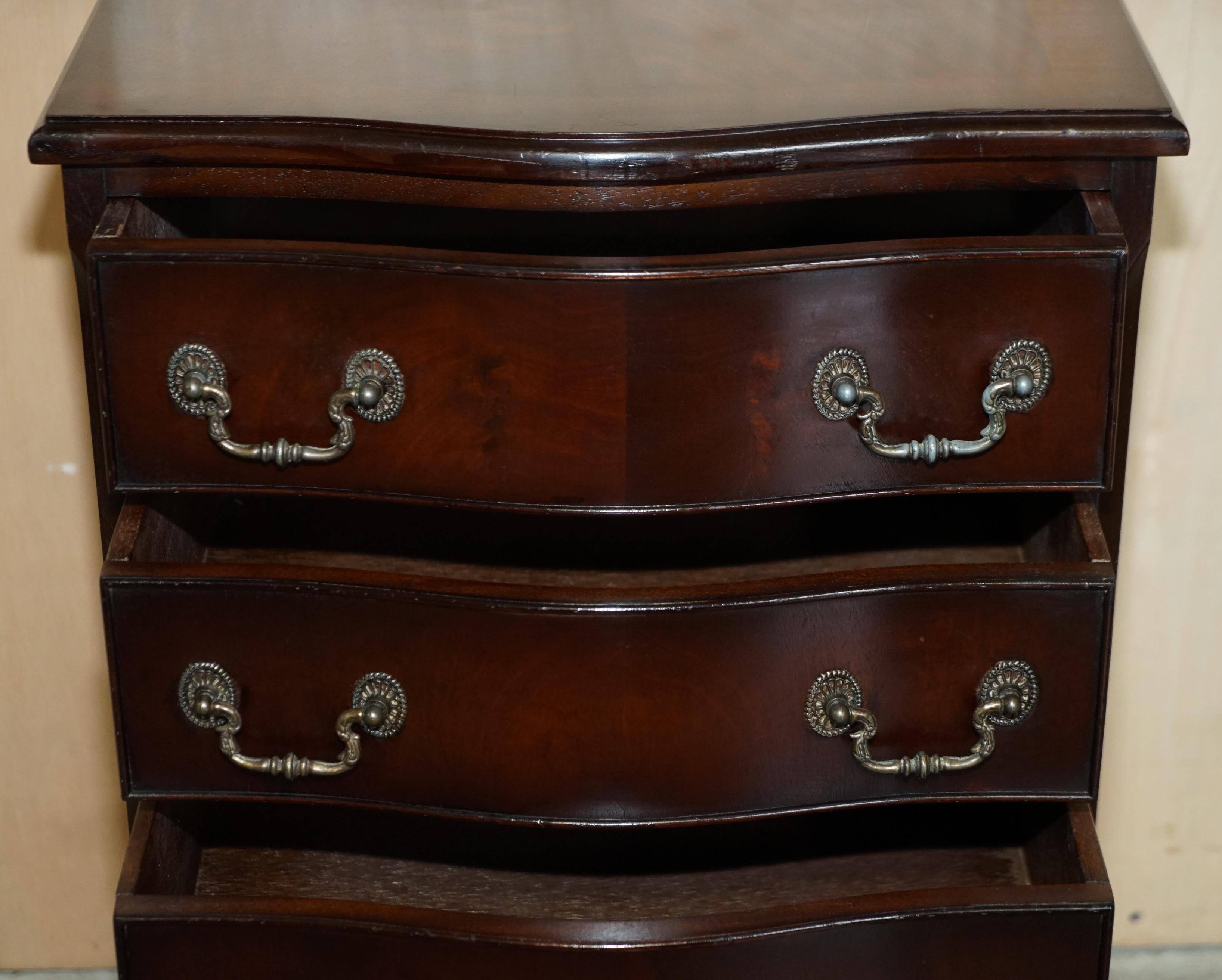 Vintage serpentine front hardwood chest of drawers