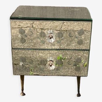 Chest of drawers with ornate mirrors