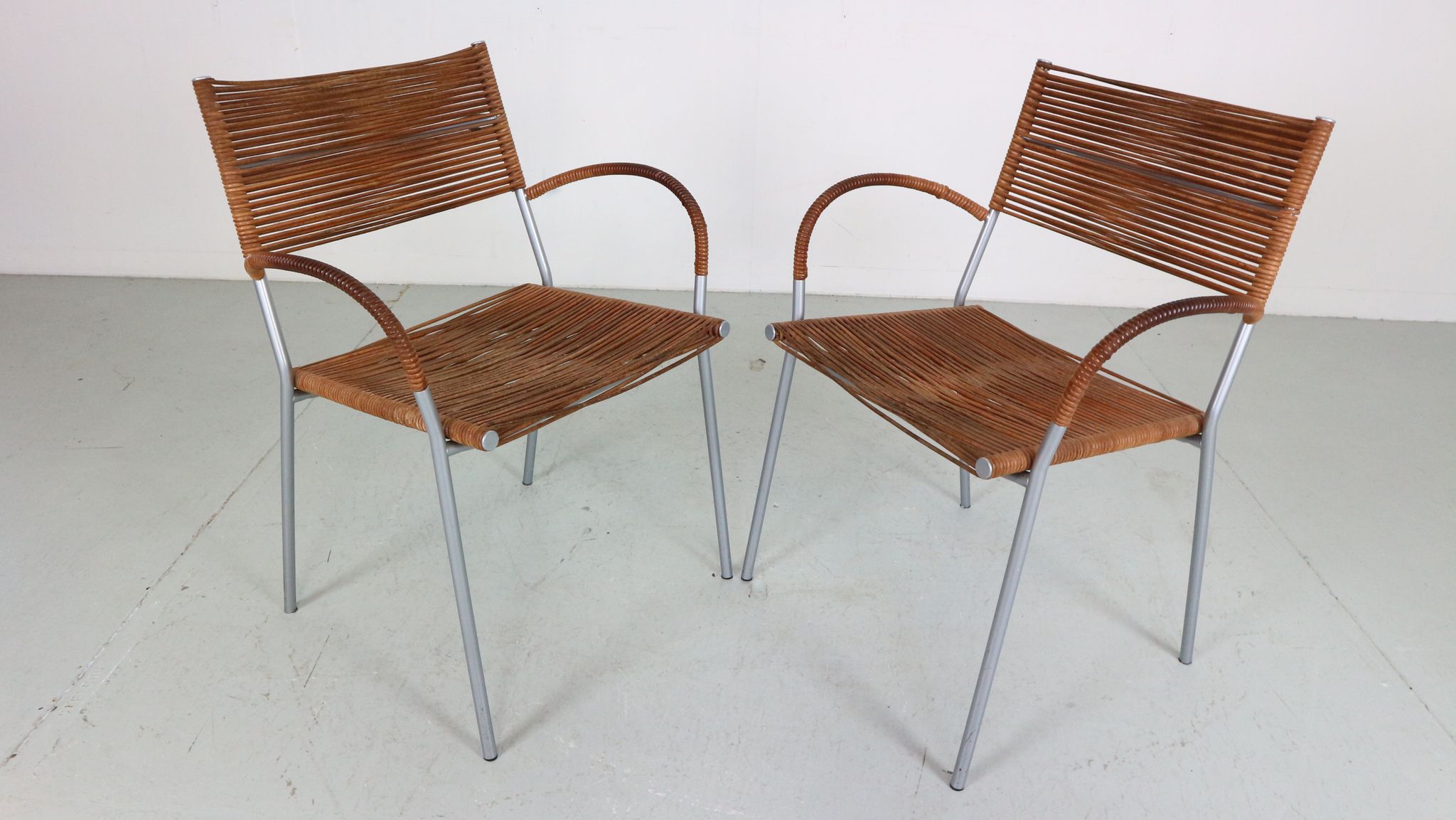 Set of 2 leather Mis B2 RVS armchairs by Tito Agnoli  for Pierantonio Bonacina