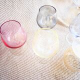 Small glasses with multicolored feet