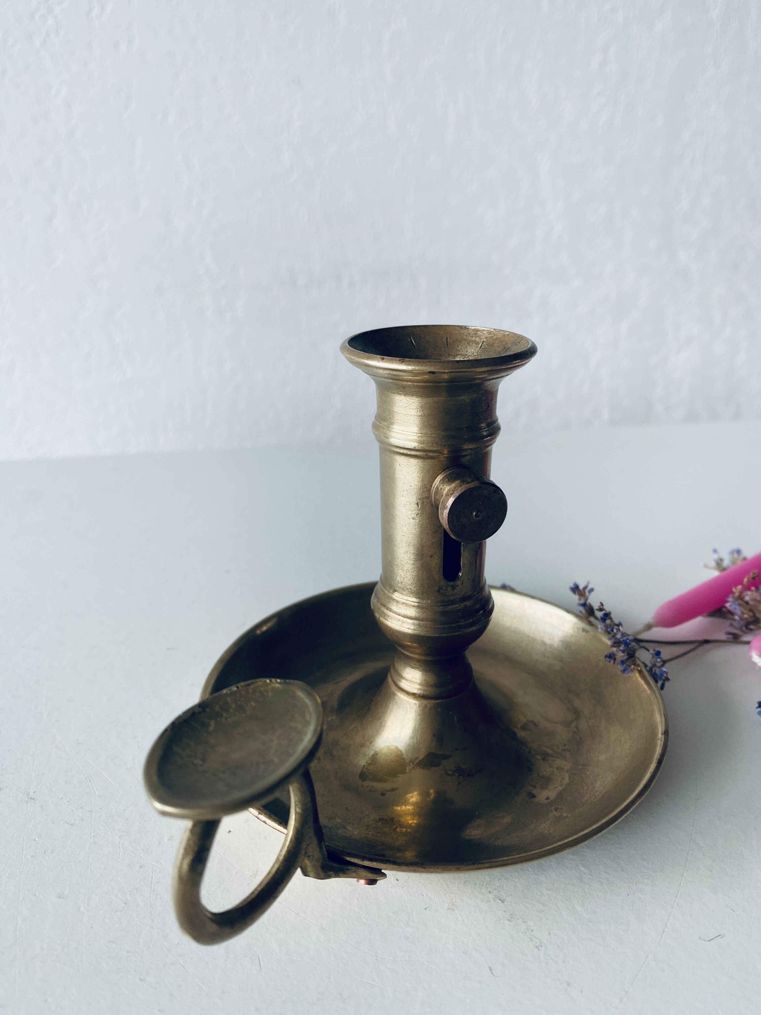 Antique brass candle holder