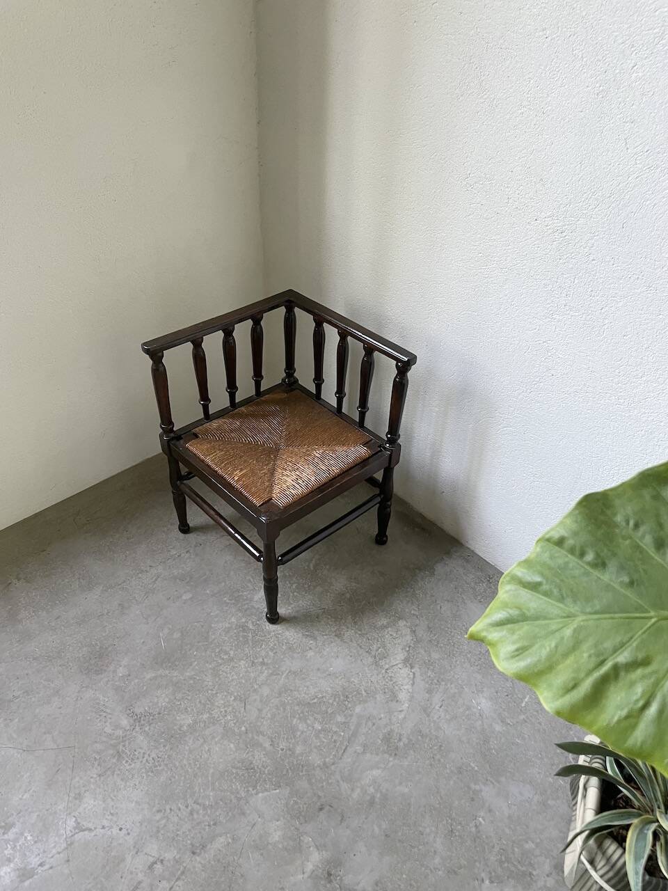 Straw chair by the fireside 1900