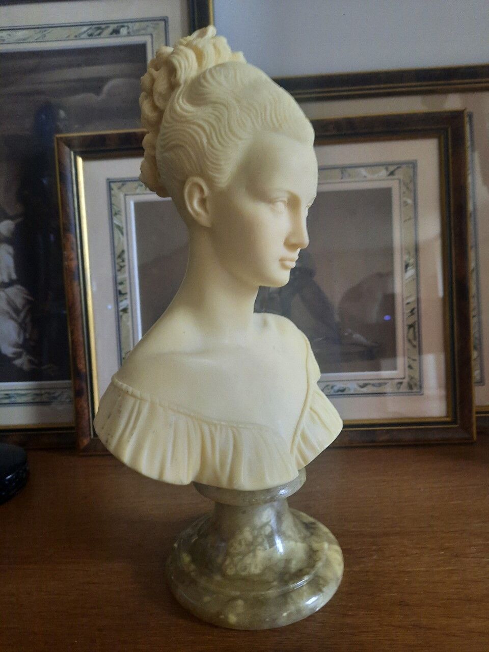 Bust woman on pedestal