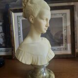 Bust woman on pedestal