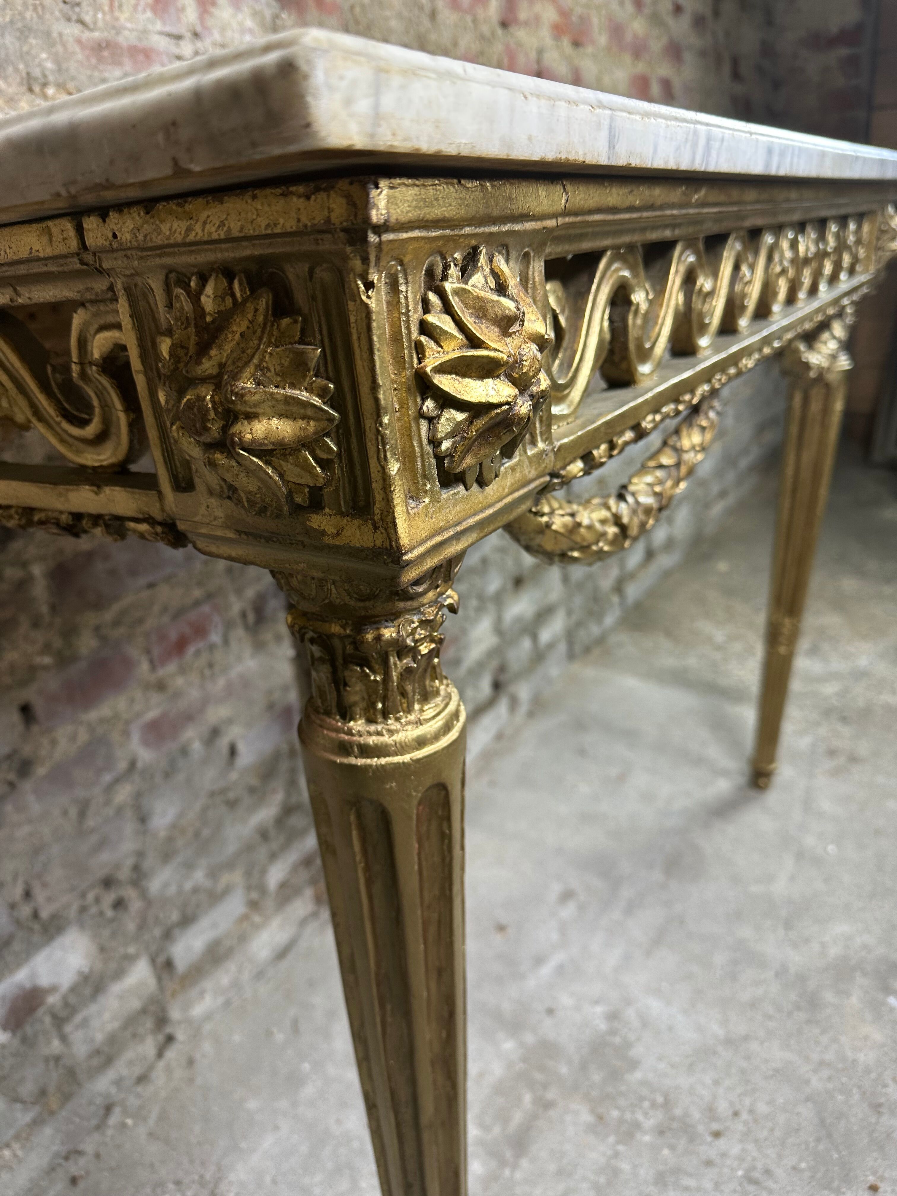 Louis XVI style console in carved wood eighteenth