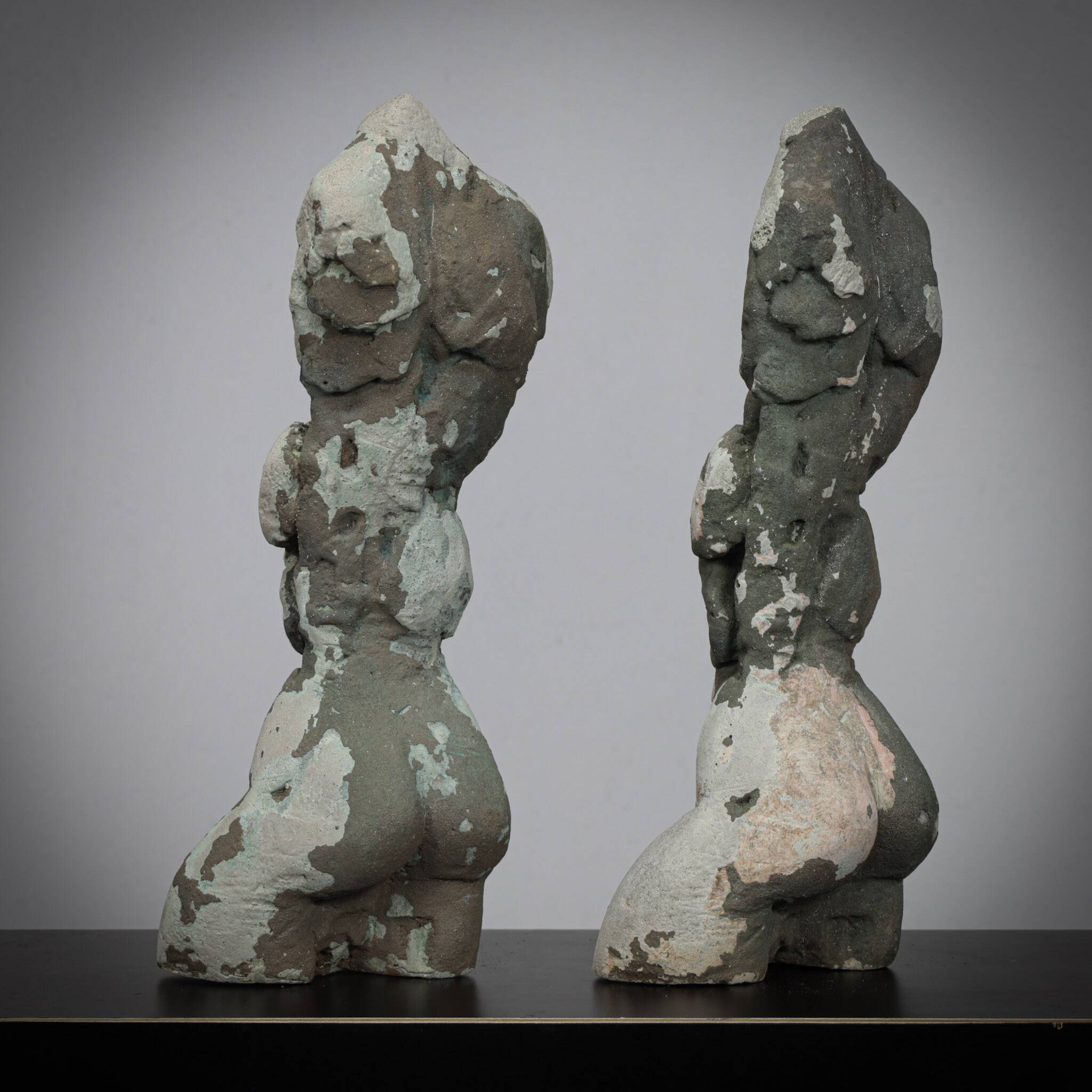 Pair of male torso sculptures by Francine Govers, 1990s