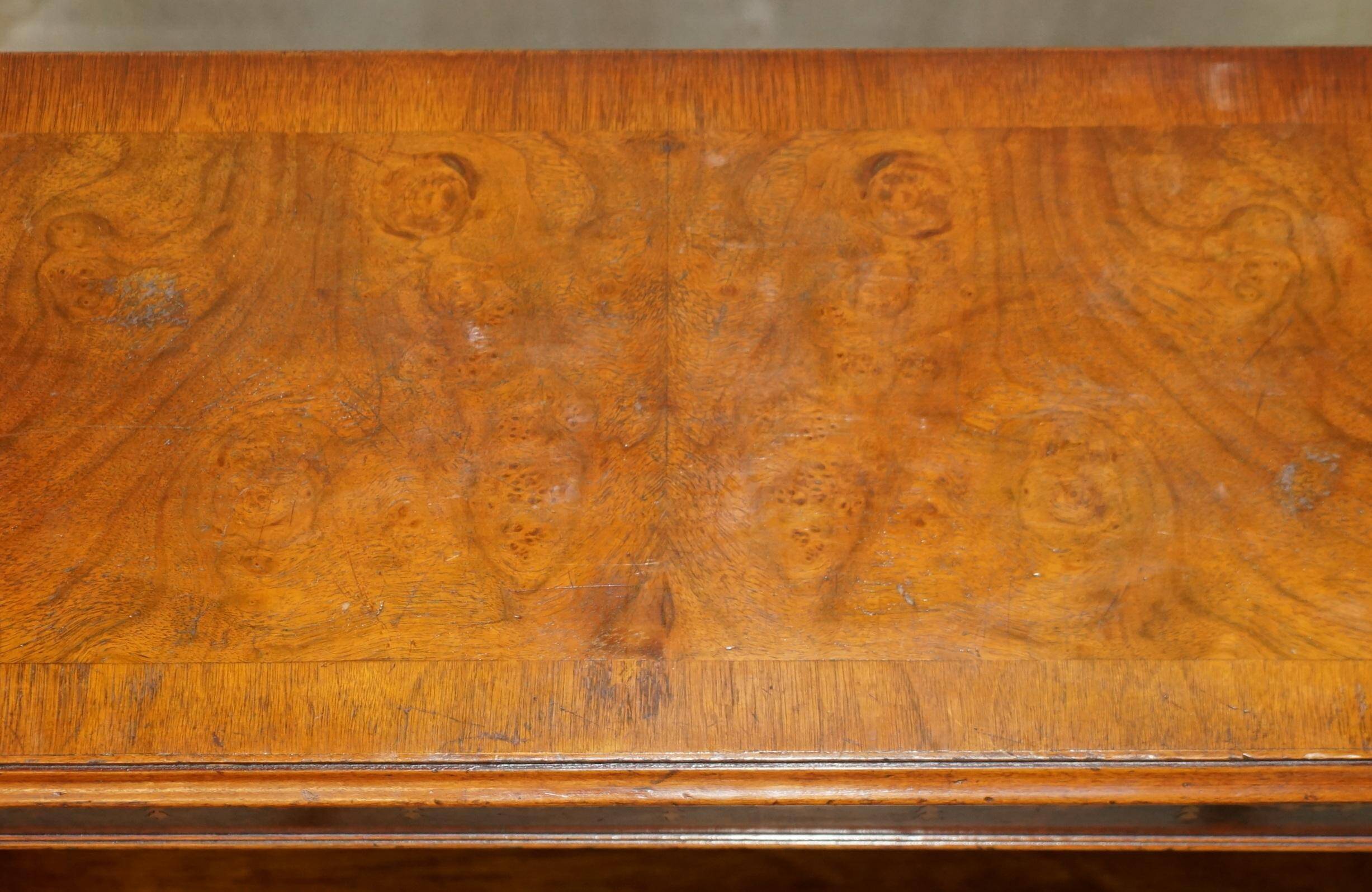Brights of Nettlebed style Sheraton dwarf library in burr elm, walnut, and mahogany.