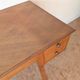 1950s oak double-sided desk with compass legs.