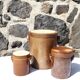 Trio of stoneware pots with lids