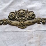 Old brass rose window, width 38cm.