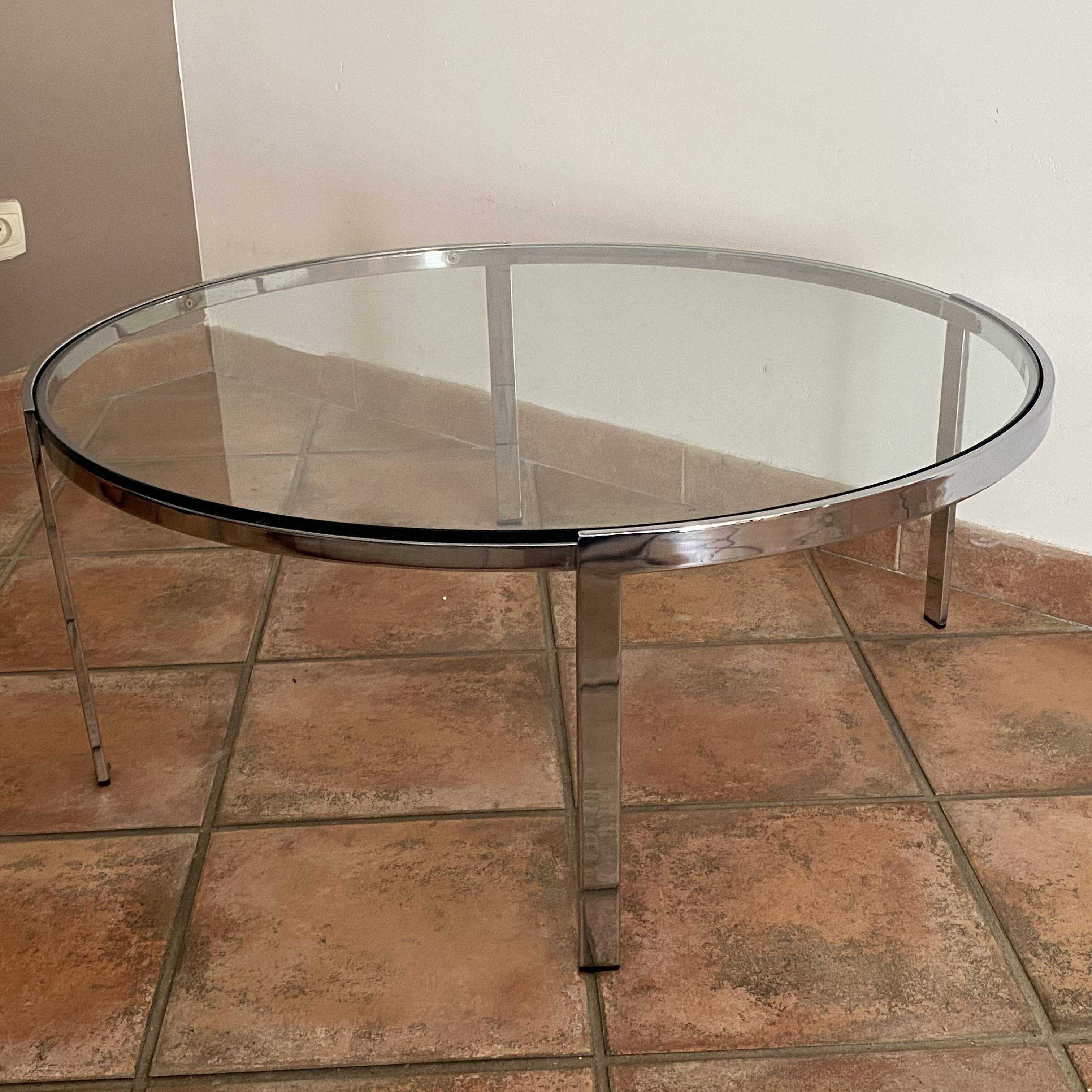 Space Age coffee table. 1970s. Chrome-plated steel and glass.