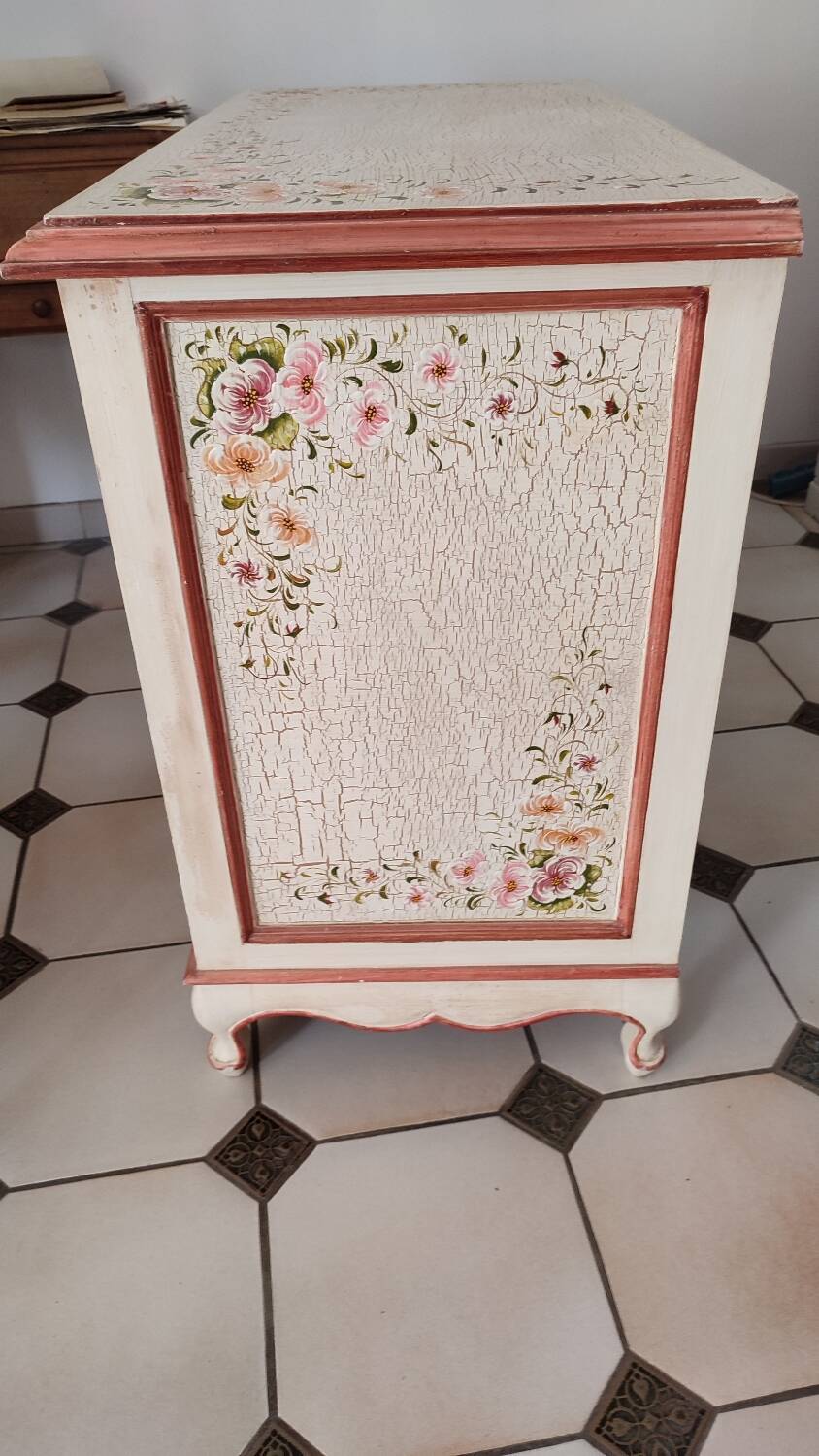 Painted chest of drawers with floral decoration