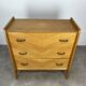 50s chest of drawers with blond wood compass feet