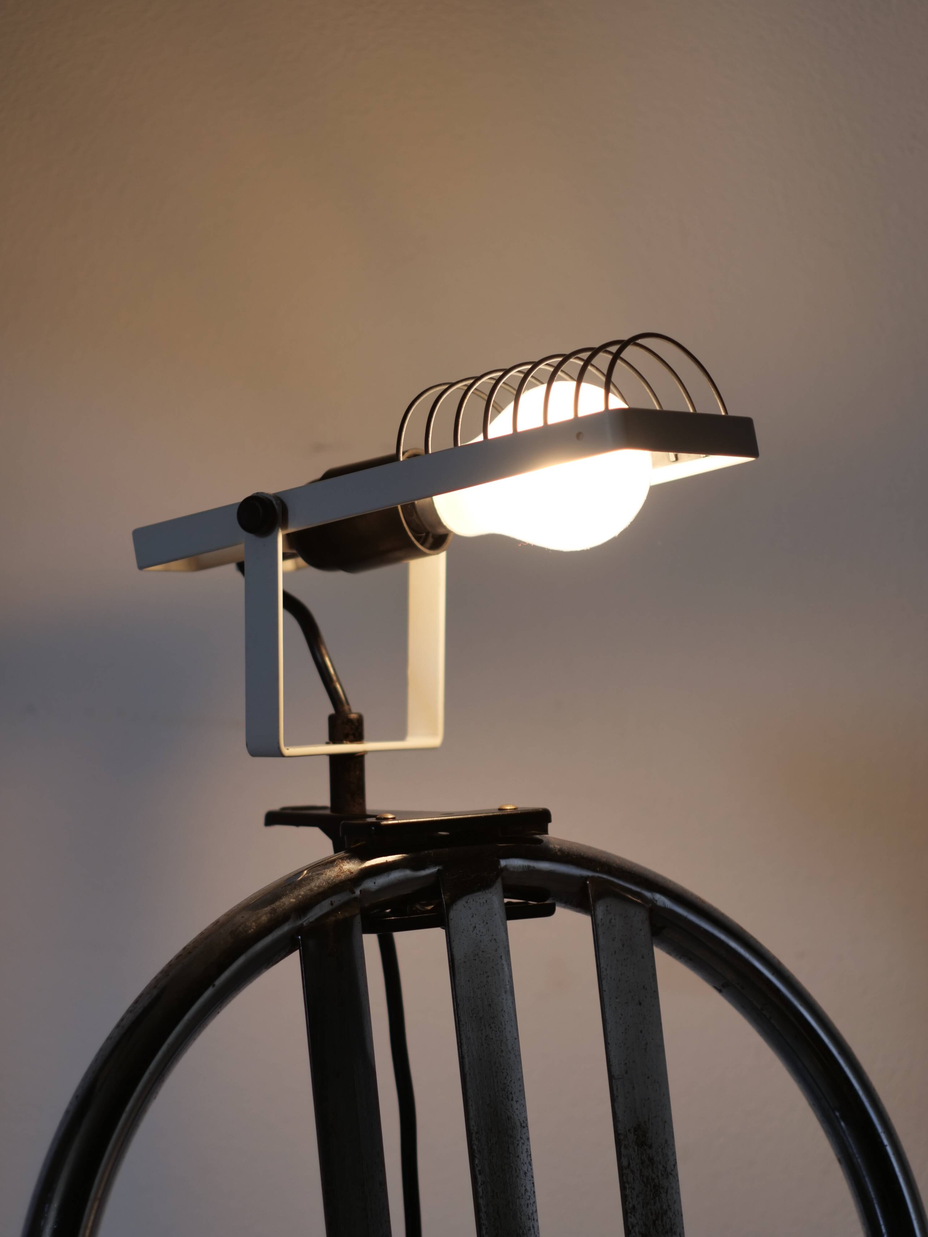 Artemide clamp lamp designed by Ernesto Gismondi model Sintesi