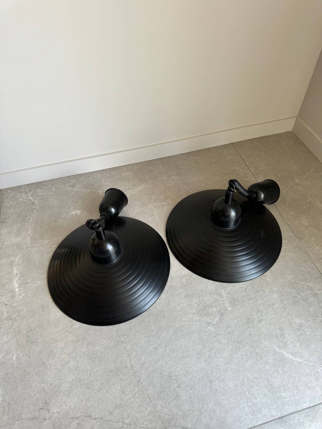 Pair of black metal pendant lights made in Belgium