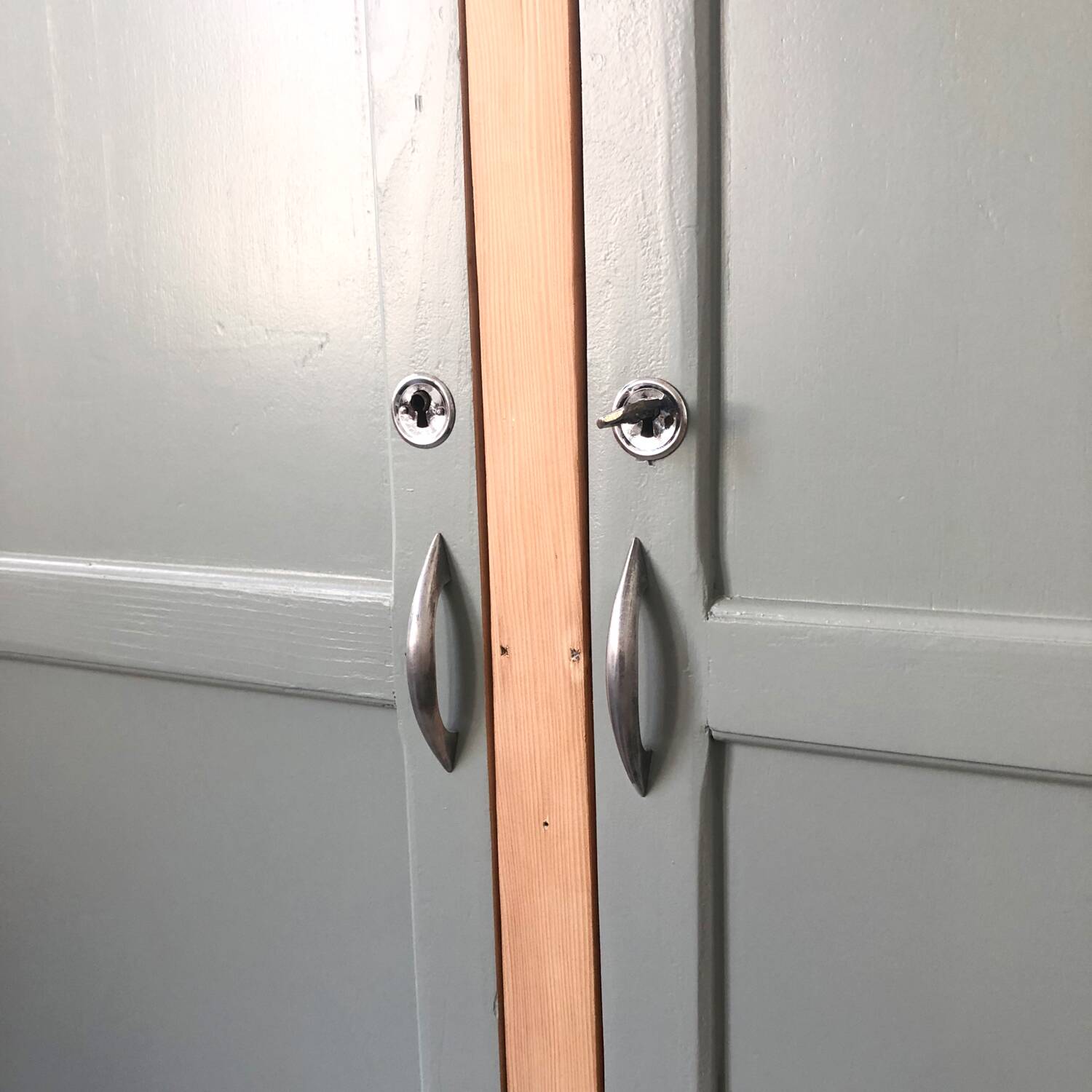 Verdigris two-door wardrobe