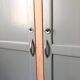 Verdigris two-door wardrobe