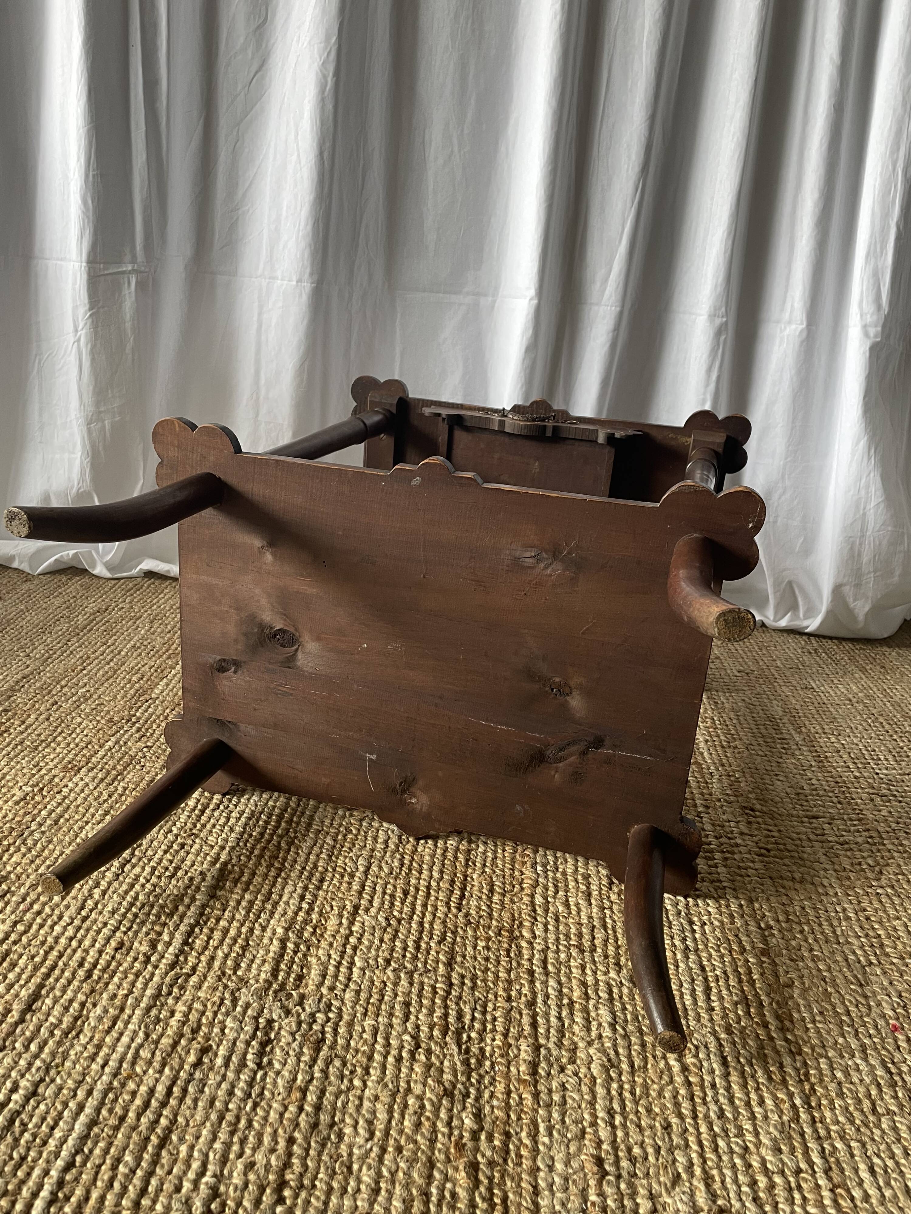 Elegant Art Nouveau side table in walnut, France early 20th century.