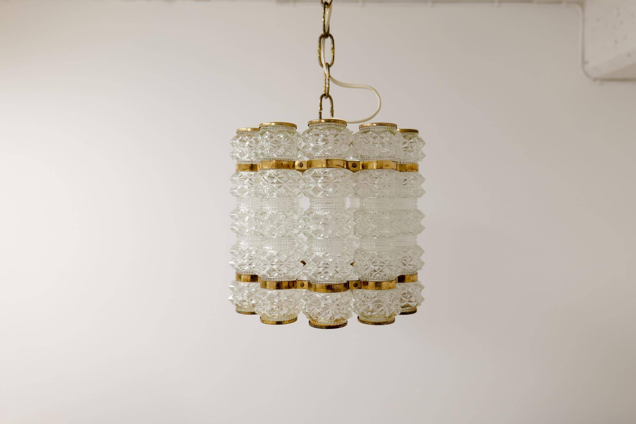 Cylindrical brass and crystal chandelier by Tyringe for Orrefors, Sweden.