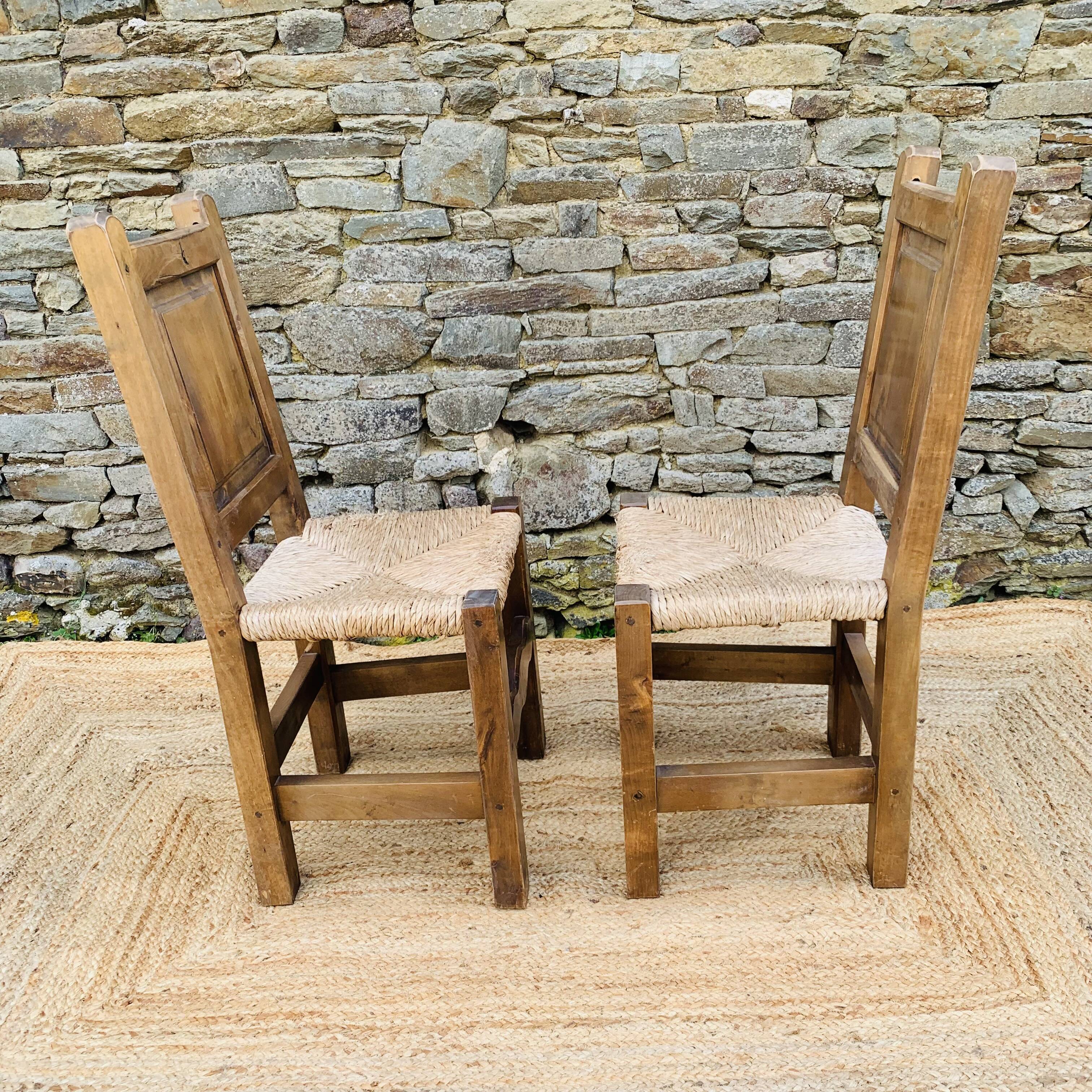 Pair of wooden and straw chairs