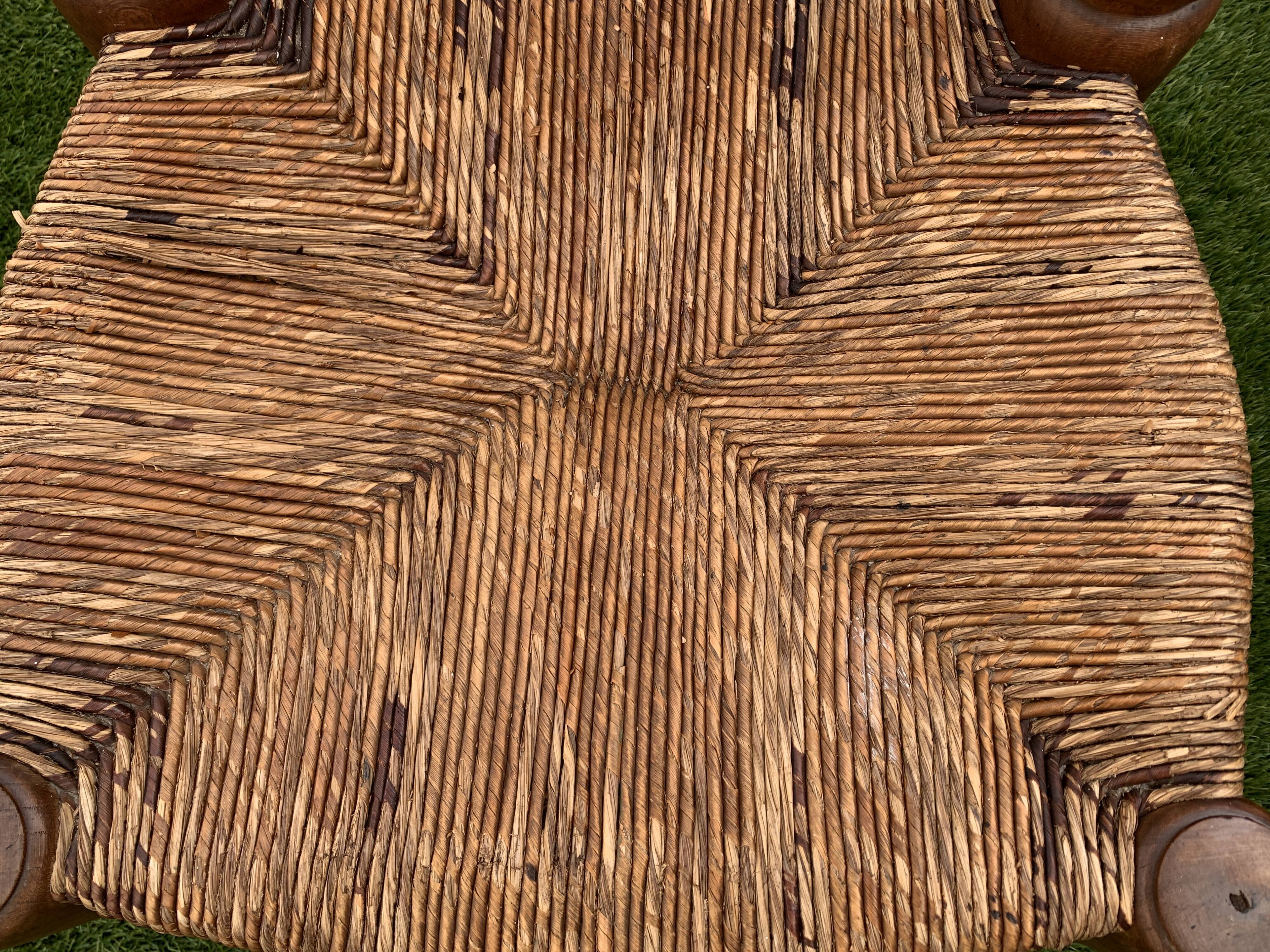 Pair of antique low fire chairs made of wood and straw
