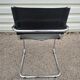 Paire de fauteuils Cantilever en cuir noir