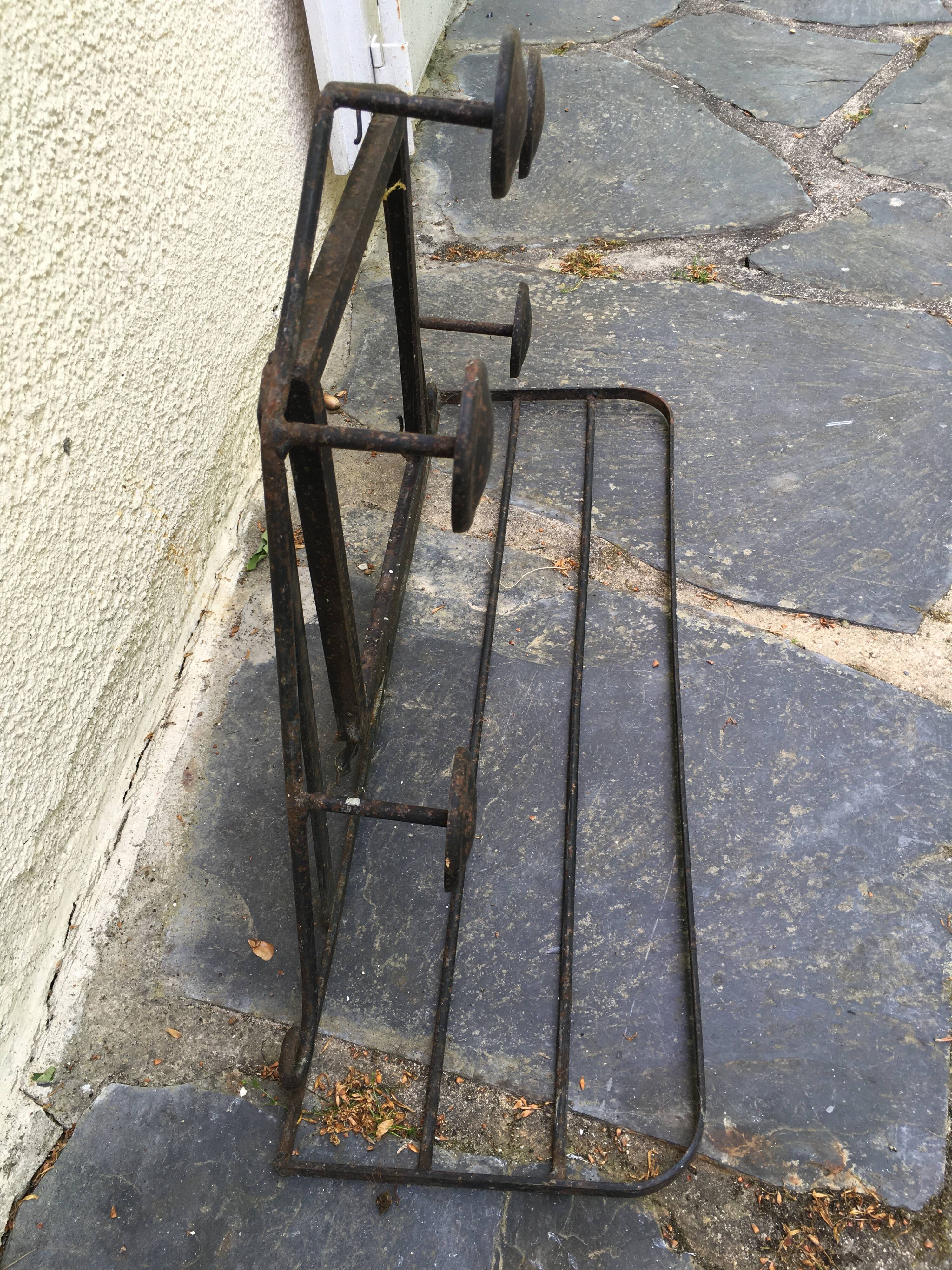Wrought iron coat rack.