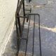 Wrought iron coat rack.