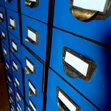 Old craft cabinet with drawers - in oak with blue bakelite front