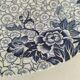 Round antique plate by Johnson Brothers in the Blue Lotus pattern.