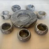 Eight grey-white marble candlesticks