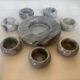 Eight grey-white marble candlesticks