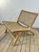 Lounge chair in solid teak and woven sea rush from the 2000s.