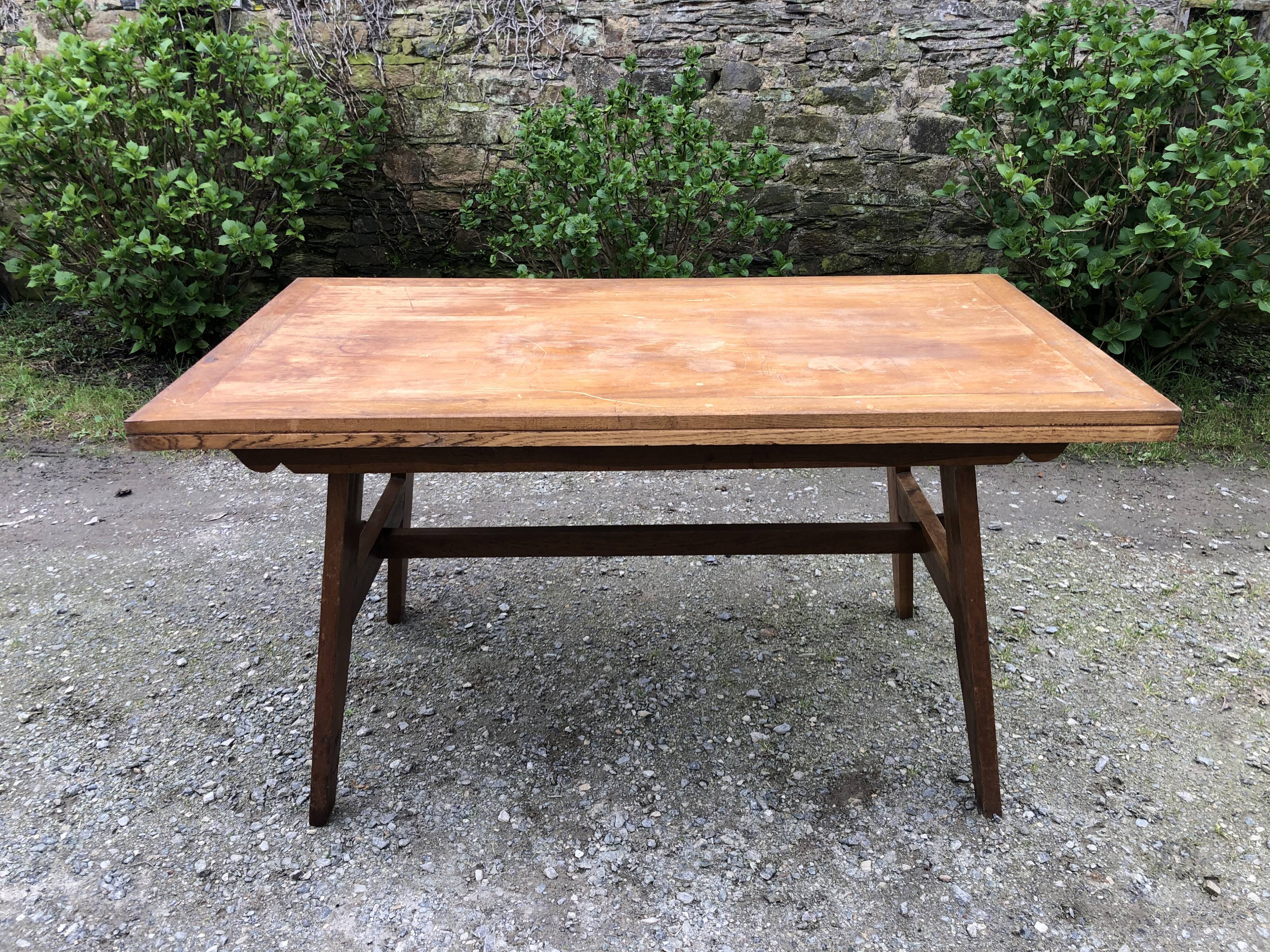 Vintage René Gabriel oak table from the reconstruction period.