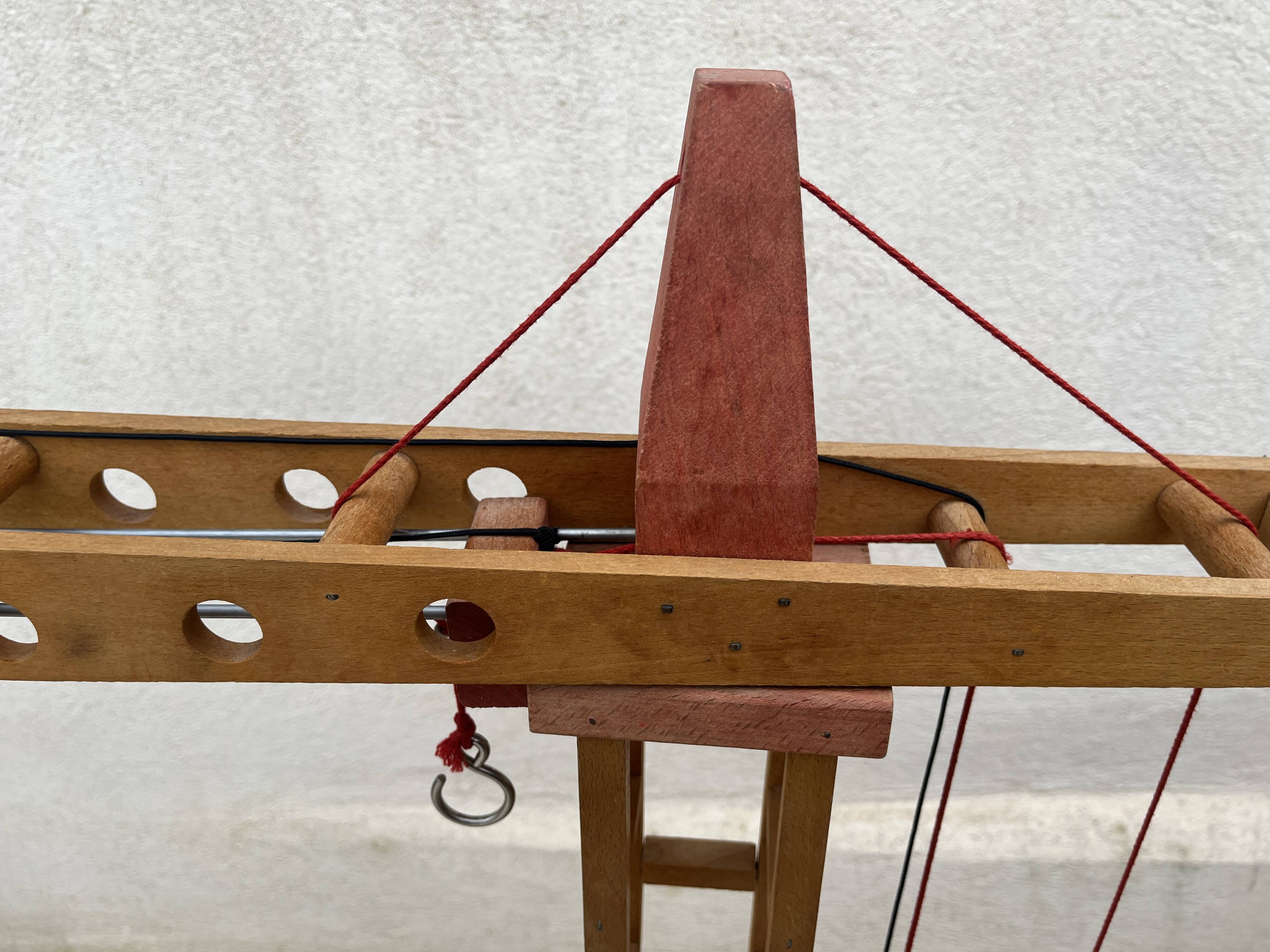 Vintage wooden crane toy from the 60s