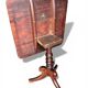 19th-century solid mahogany table with a tilting top and brass mechanism.