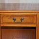 Vintage yew wood library/buffet with three drawers.