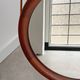 Mid Century solid teak wall mirror with a leather strap - Danish design