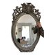 Miroir ovale biseaute  en bois et stuc