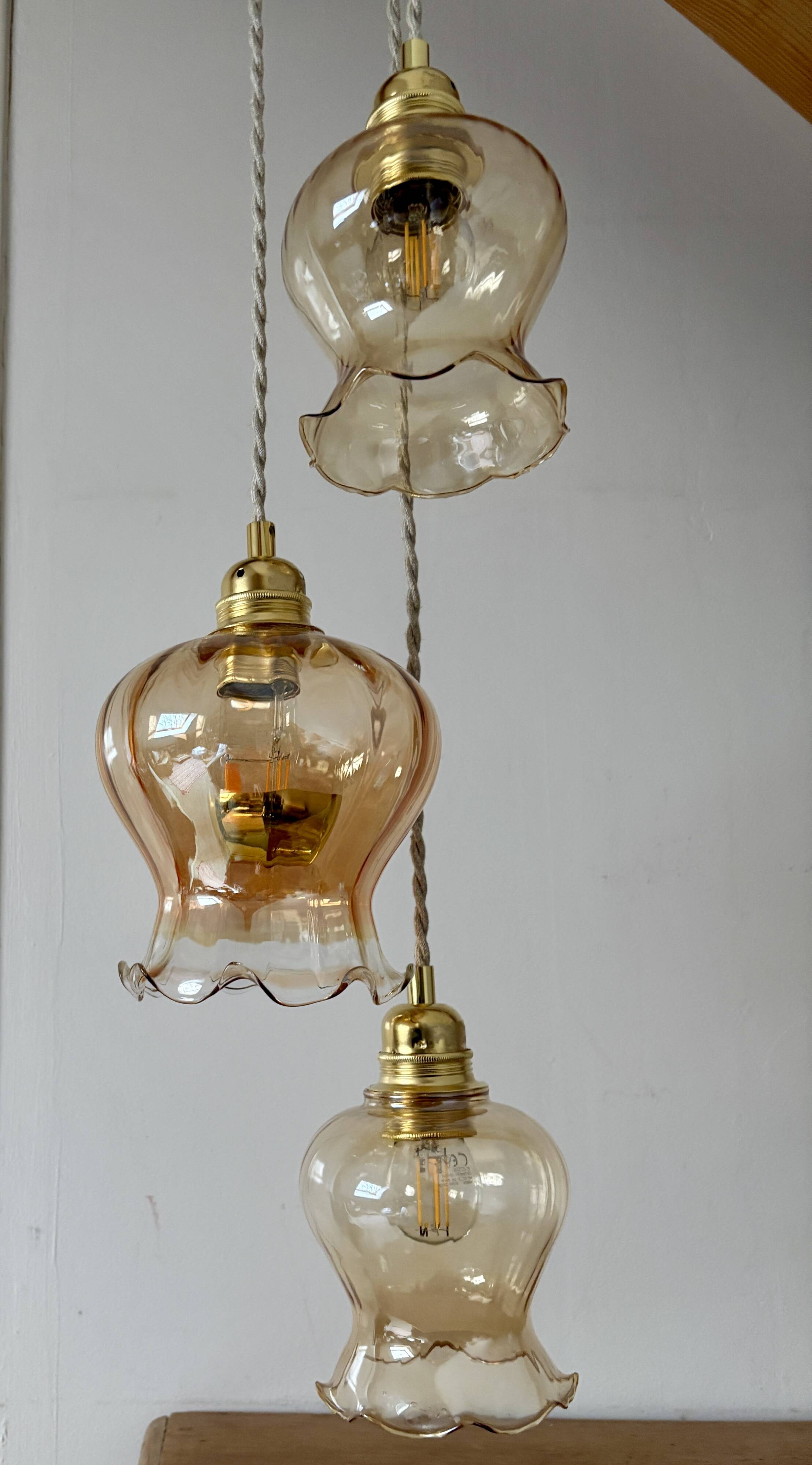 Triple vintage tulip pendant light in amber glass