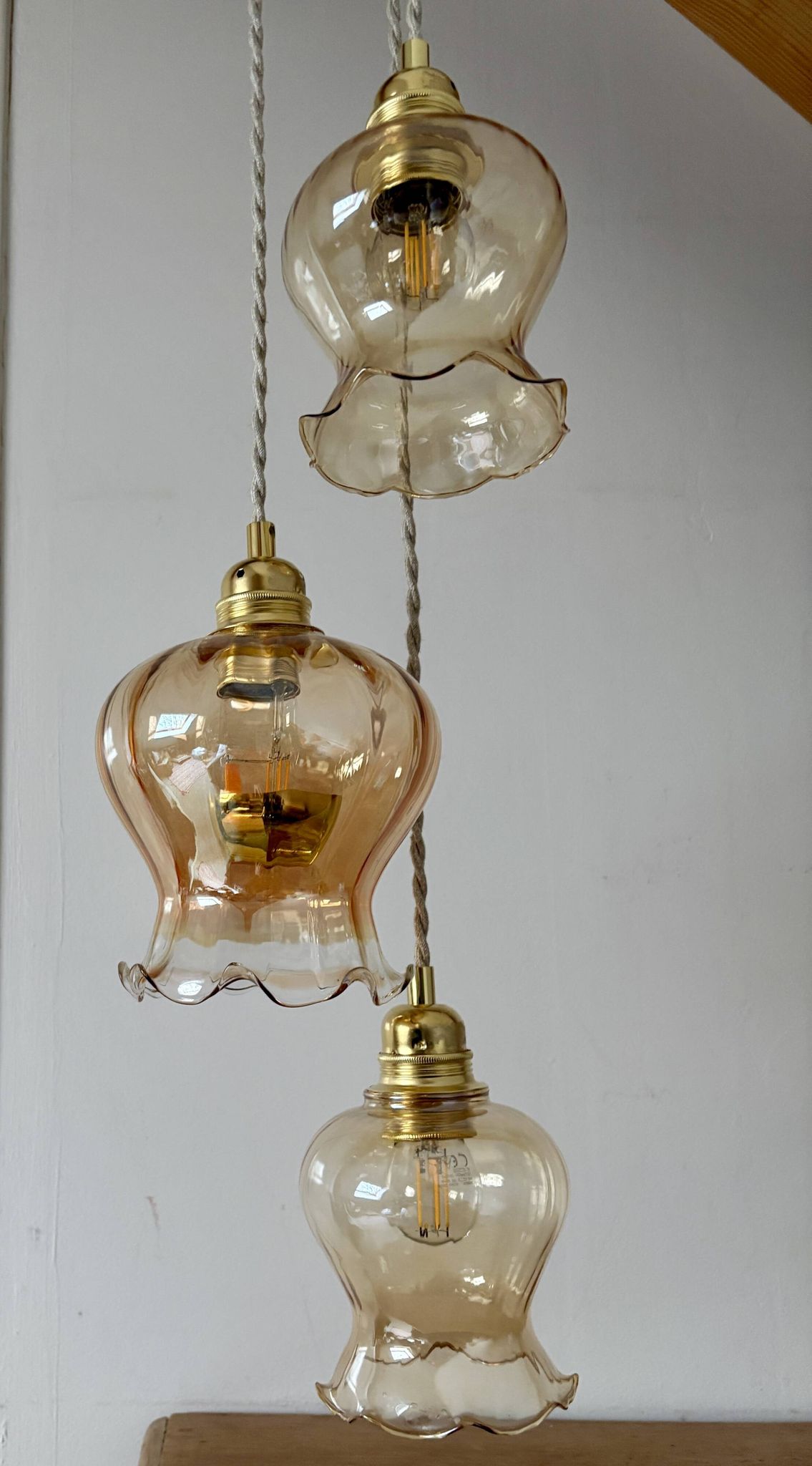 Triple vintage tulip pendant light in amber glass