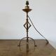 Large "Arts & Crafts" style lamp in beaten iron with a golden patina.