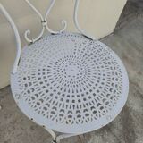 Pair of wrought iron garden chairs, antique manufacture