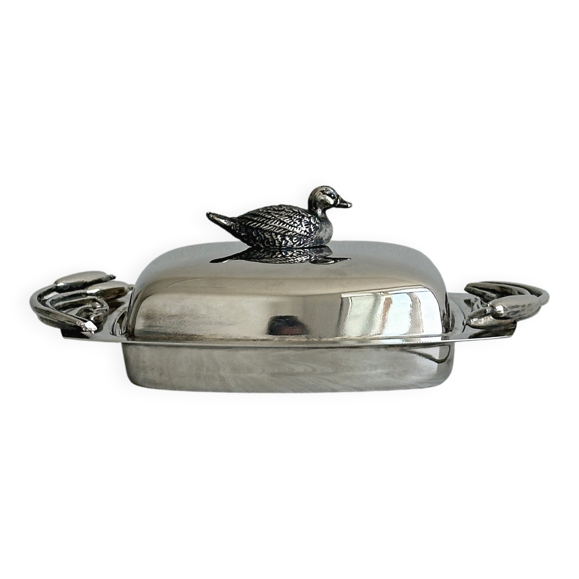 Antique shiny metal butter dish