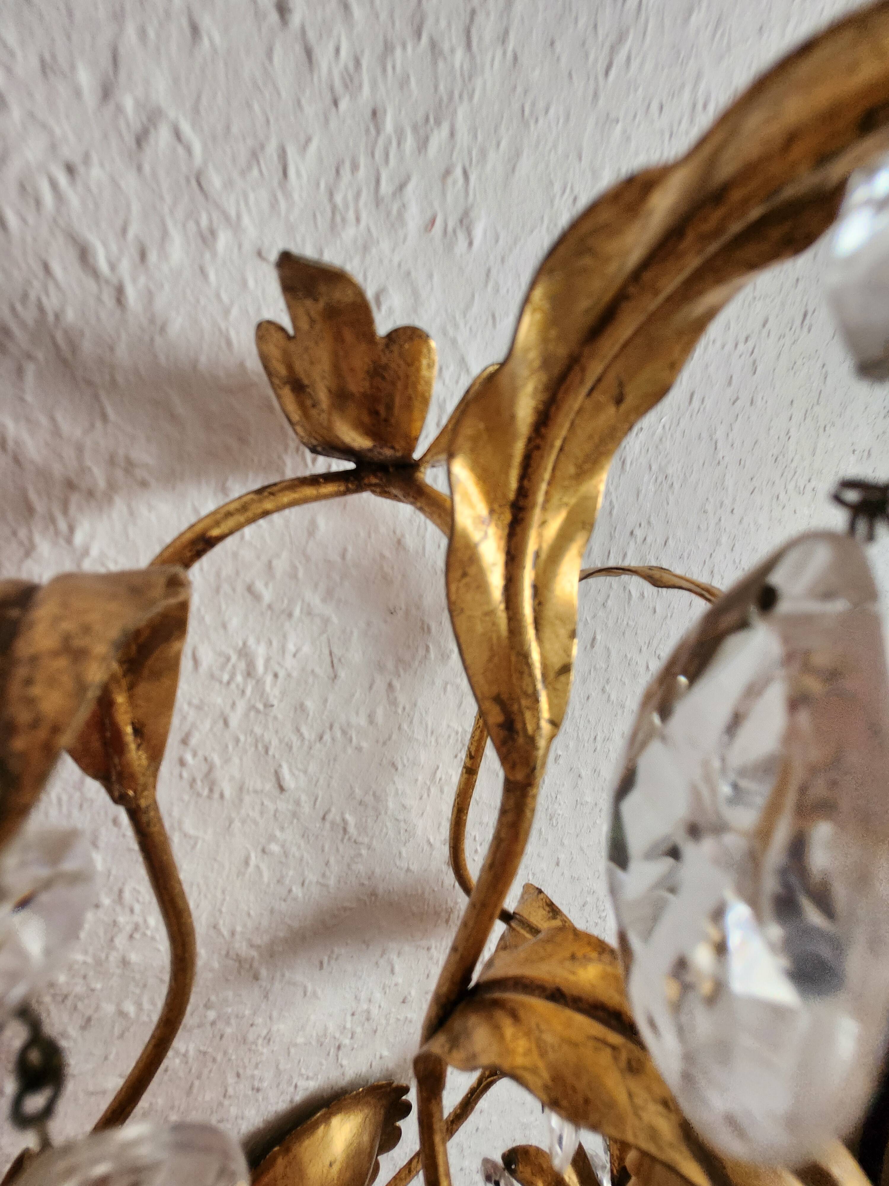Hand-forged wall lamp gilded with gold leaf and crystals, Italy